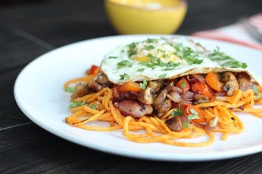 Fried Egg and Sweet Potato Noodles with Bacon & Vegetable Hash