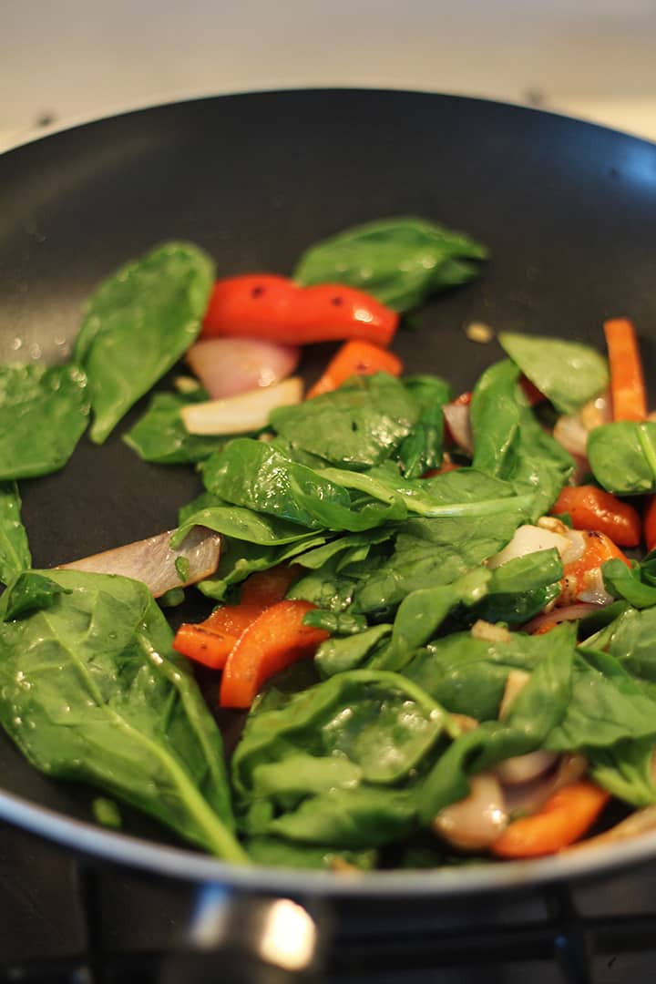 cooking vegetables with garlic, ginger and serrano peppers