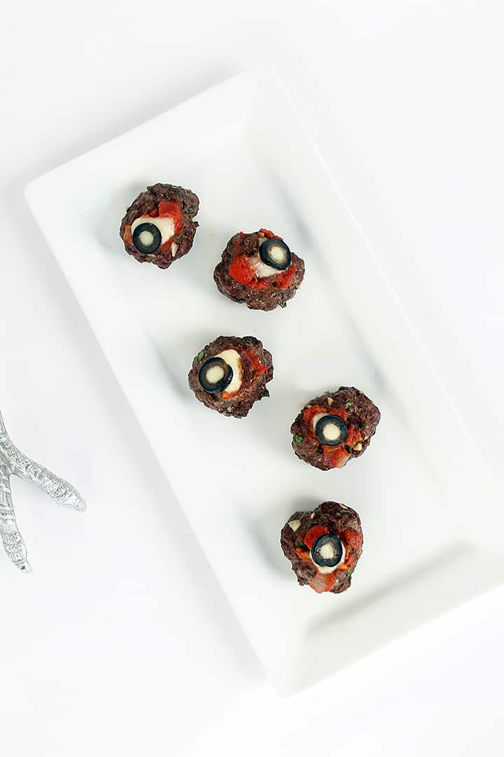 Spooky Sweet Potato “Worms” with Oozing Beef “Eyeballs”