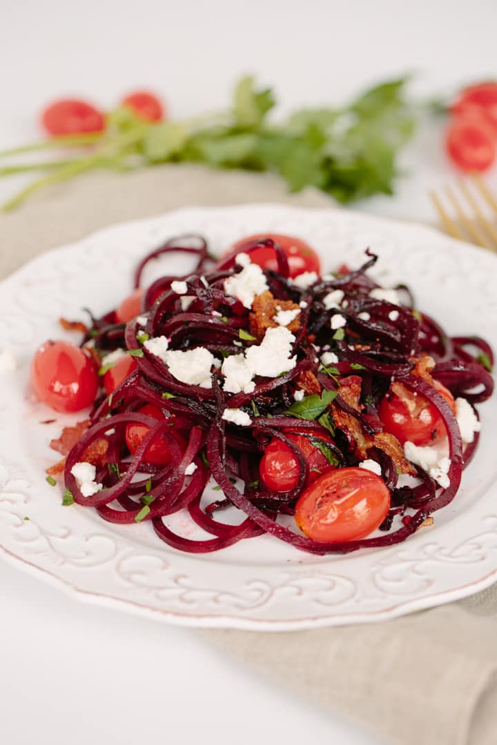 Beet Noodles with Tomatoes, Feta and Bacon