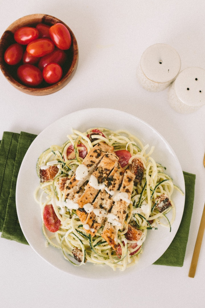 Gluten-Free Caesar Zucchini Noodles with Grilled Lemon Chicken, Tomatoes and Breadcrumbs