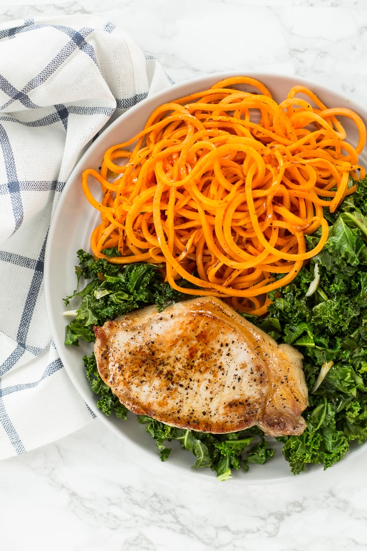 Sweet Potato Noodles with Garlic Kale and Pork Chops