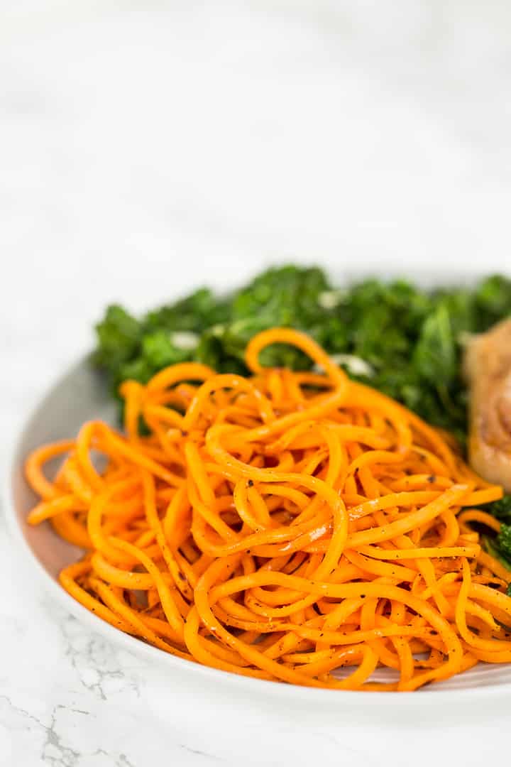 Sweet Potato Noodles with Garlic Kale and Pork Chops