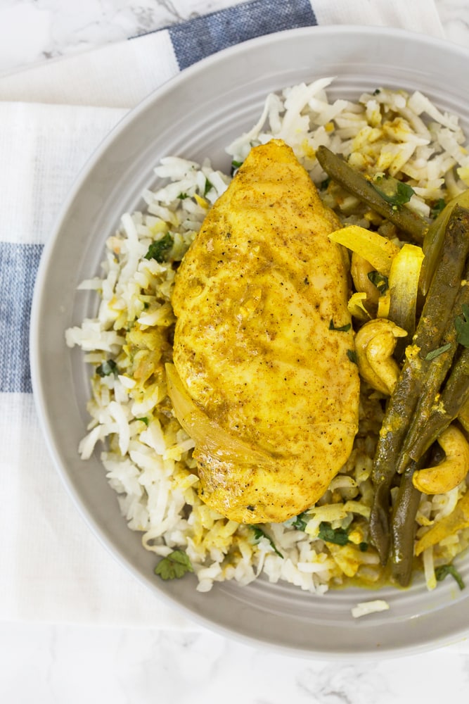 Slow Cooker Curry Cashew-Coconut Chicken with Ginger-Cilantro Turnip Rice