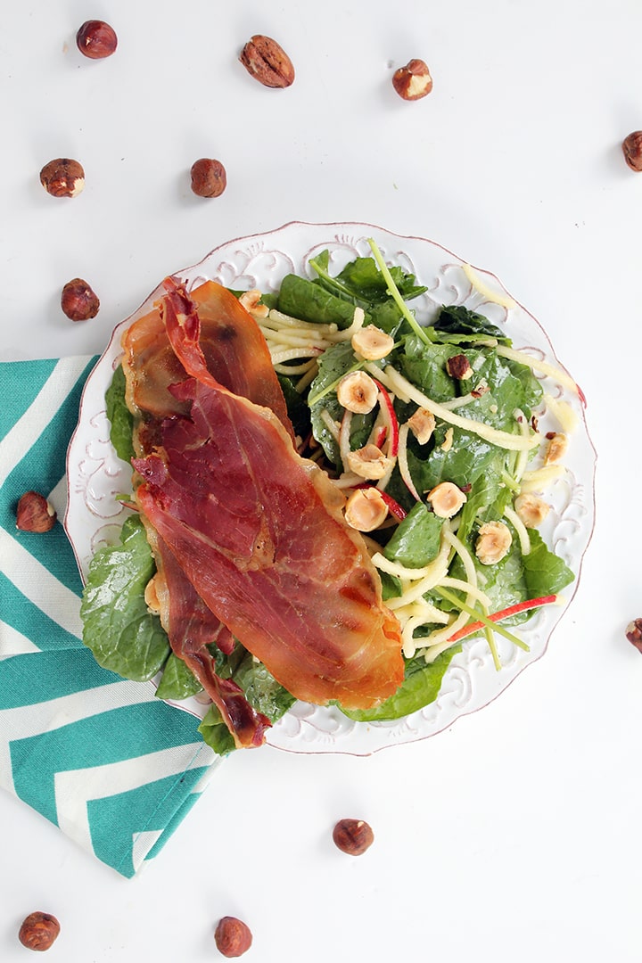  APPLE NOODLE AND PROSCIUTTO BABY KALE SALAD WITH ROASTED HAZELNUTS