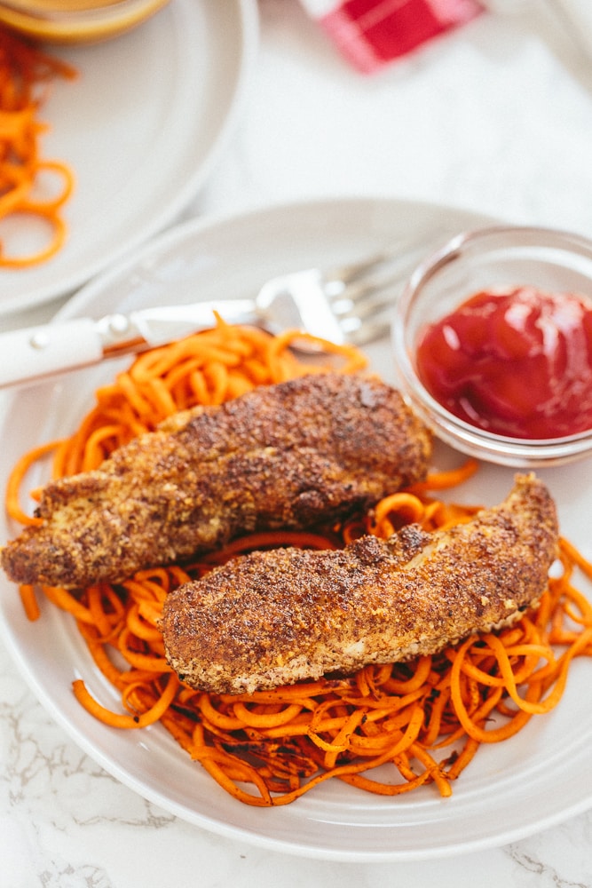 FLAXSEED CRUSTED CHICKEN TENDERS WITH SPIRALIZED SWEET POTATOES