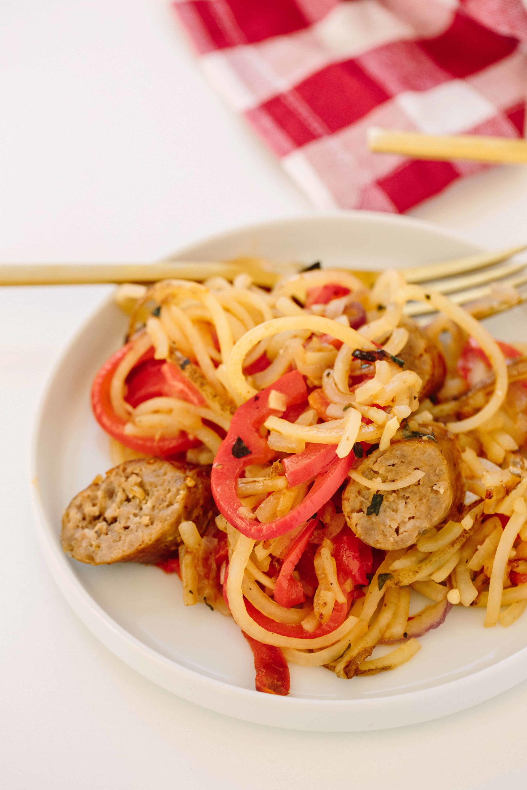 Mom's Spiralized Peppers, Onions, and Potatoes with Sausage