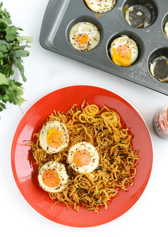 SPIRALIZED GARLIC SRIRACHA HASH BROWNS WITH BAKED EGGS