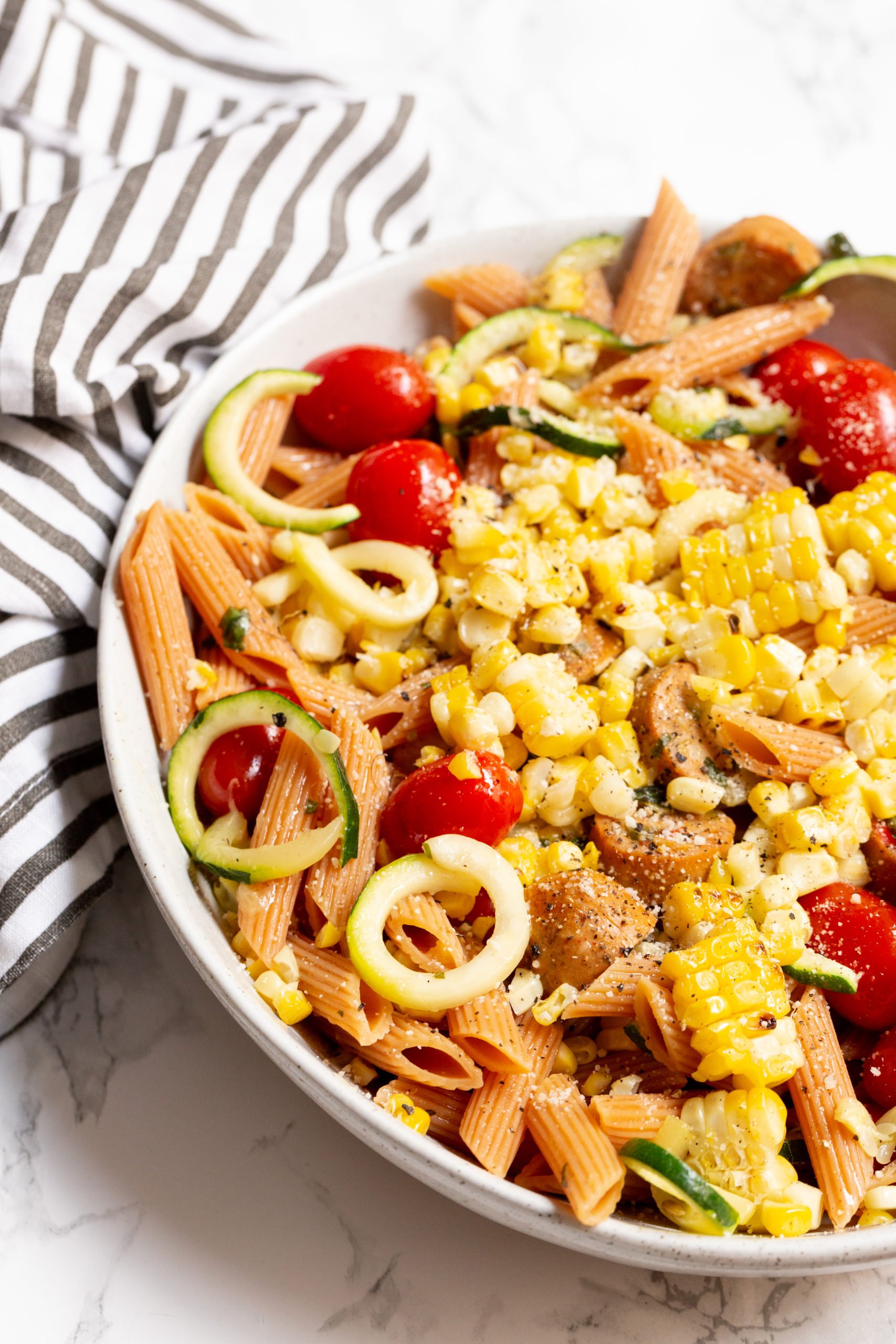 Zucchini and Grilled Corn Pasta with Chicken Sausage and Garlic-Basil Dressing